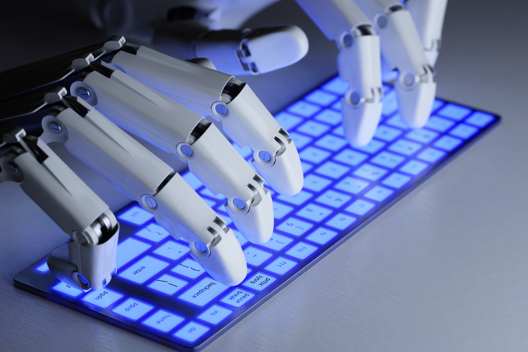 Robotic AI hands typing on a keyboard.